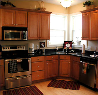 Black Kitchen Cabinets on For Contrast In The Kitchen They Chose Maple Cupboards Black Granite