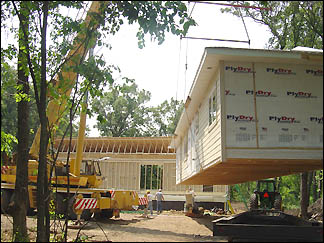 Lifting home onto site