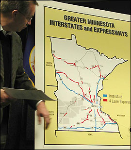 MnDOT engineer with map - photo by Michael Jacobsob