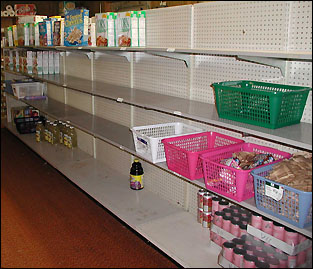 Empty food shelves - photo by Ryan Flanders