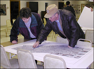 Residents examine Hwy 23 route map - photo by Bonnie Jo Hanson