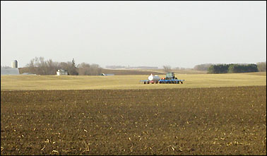 Tractor in field - photo by Jennifer E. Johnson