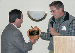 Dr. Jim Hess receiving award