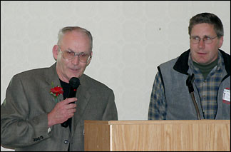 Keith Deadrick accepting award for stepmother