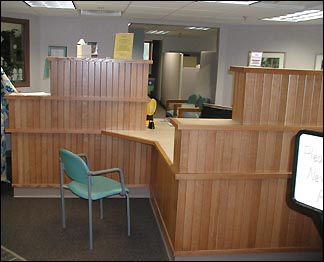 New front desk with privacy stalls