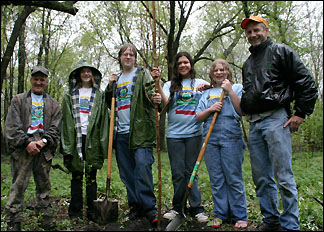 Trail Guards plant trees