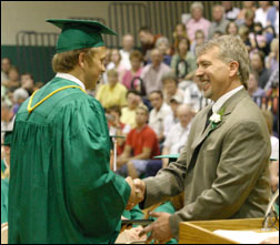 Receiving a diploma