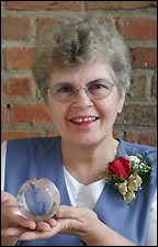 Marlys Pearson holds her award