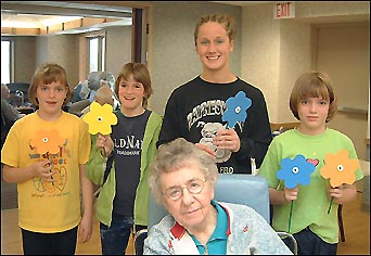 Bachman with the elderly and other girl scouts