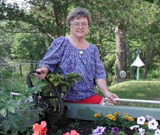Gloria Scheel with her flowers