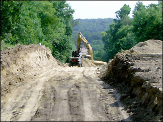 Cutting down "Tolman's Hill"