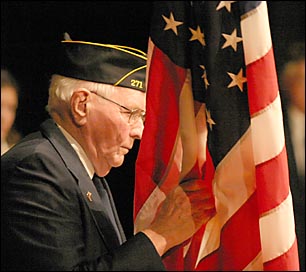 Veteran  removing flag