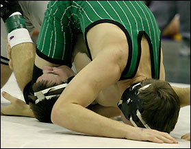 Matt Kerzman pinning his opponent
