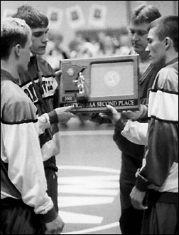 Wrestlers with trophy