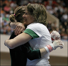 Kacy hugging coach/mother