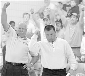 Wrestling coaches Virg Vagle and Steve Fuchs celebrate win
