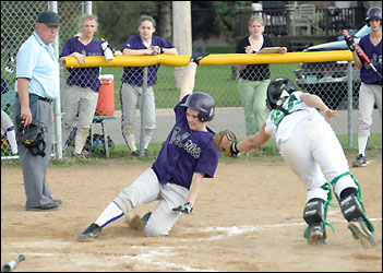 Softball play at plate