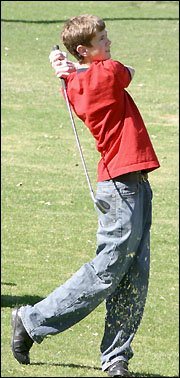 Justin golfing