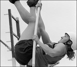 Melissa Bachman vaults over the bar