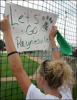 Kelli holds sign