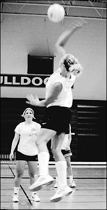 spiking the volleyball