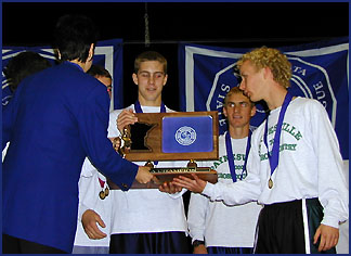 Boys receiving trophy