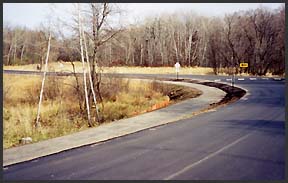 Curve at junction of Breezewood and NW Koronis roads