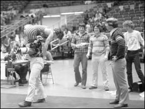 Coach Vagle lifting Steve Fuchs in 1978