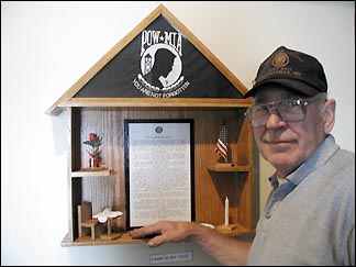 Leroy Mackedanz and his POW/MIA display