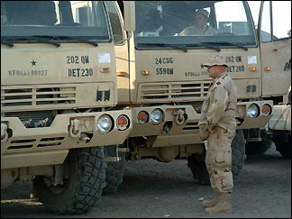 Mark Leyendecker inspects trucks