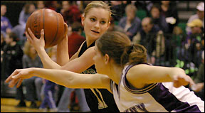 Kendra Johson passes the ball