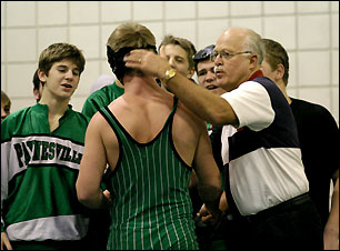 Congratulating wrestler