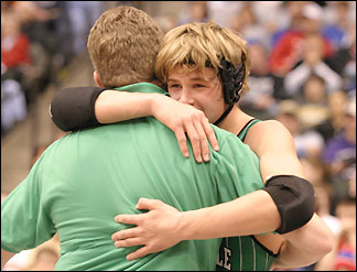 Coach Woehler hugs Sean Glenz