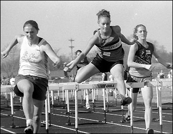 Kendra Johnson hurdling