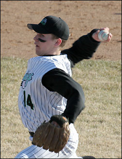 Senior John Hemingson pitching