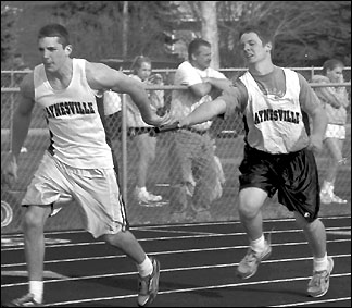 Ben Lingl hands off to Josh Teicher