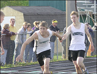 Chad Wyffels hands baton to Tom Flannigan