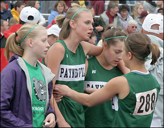 Relay team hug