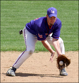 Shortstop Doug Fuchs fields a grounder