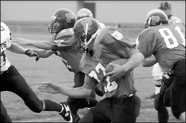 Milan Virant carries ball